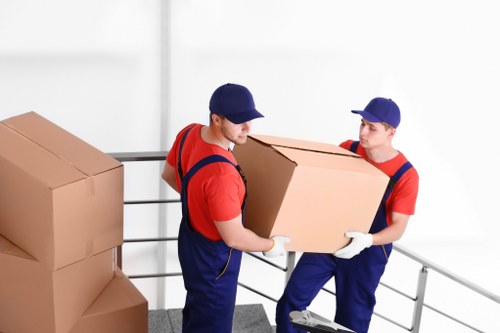 Business furniture and equipment being prepared for a Hampton commercial move