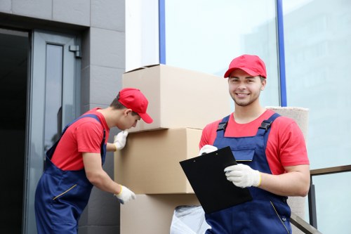 Man and van removal team handling furniture in Hampton