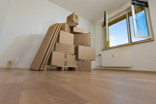 Loading furniture and boxes into a removal van for a Hampton customer