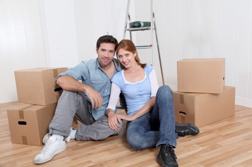 Movers preparing a local Hampton home move with boxes and furniture