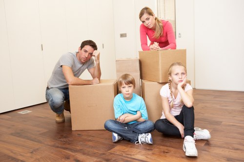 Local moving team handling boxes and household items
