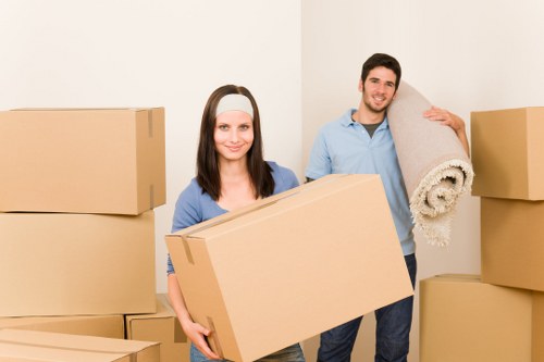 Office relocation team moving furniture and equipment in Hampton