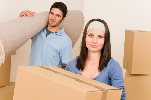 Packed boxes and furniture ready for transport by a local removals company
