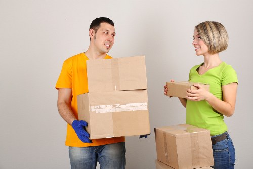 Moving team organising boxes and furniture for transport